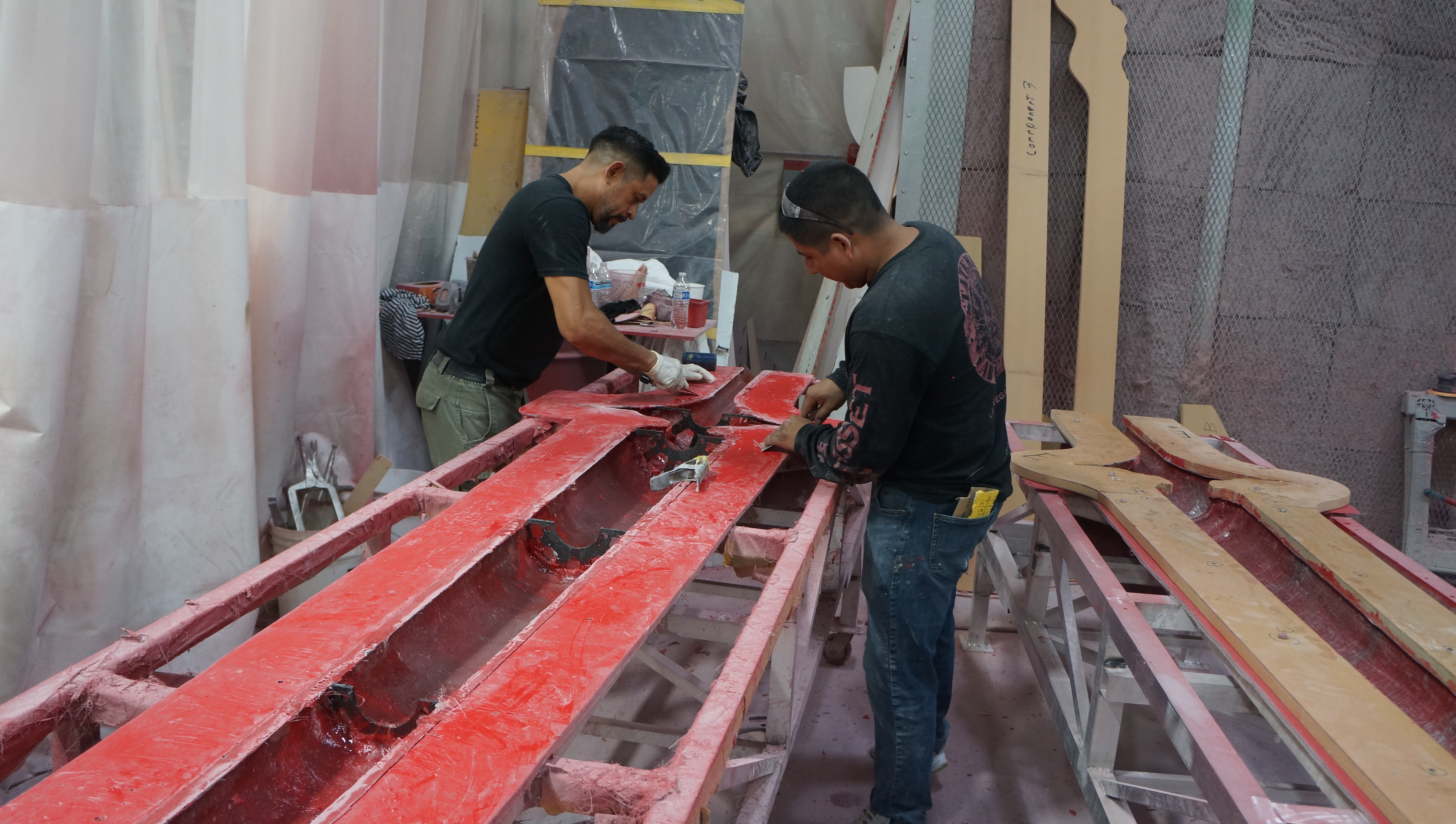 Skilled fabricator working on industrial fiberglass components